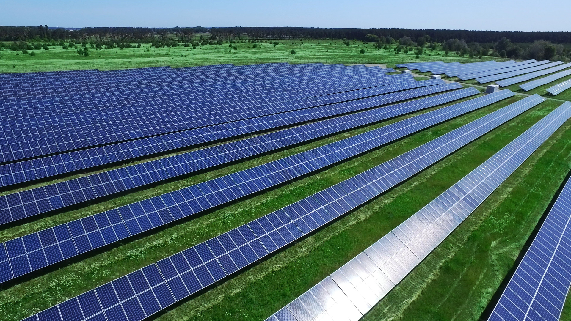 Clean energy production with solar park. Aerial view of solar energy field